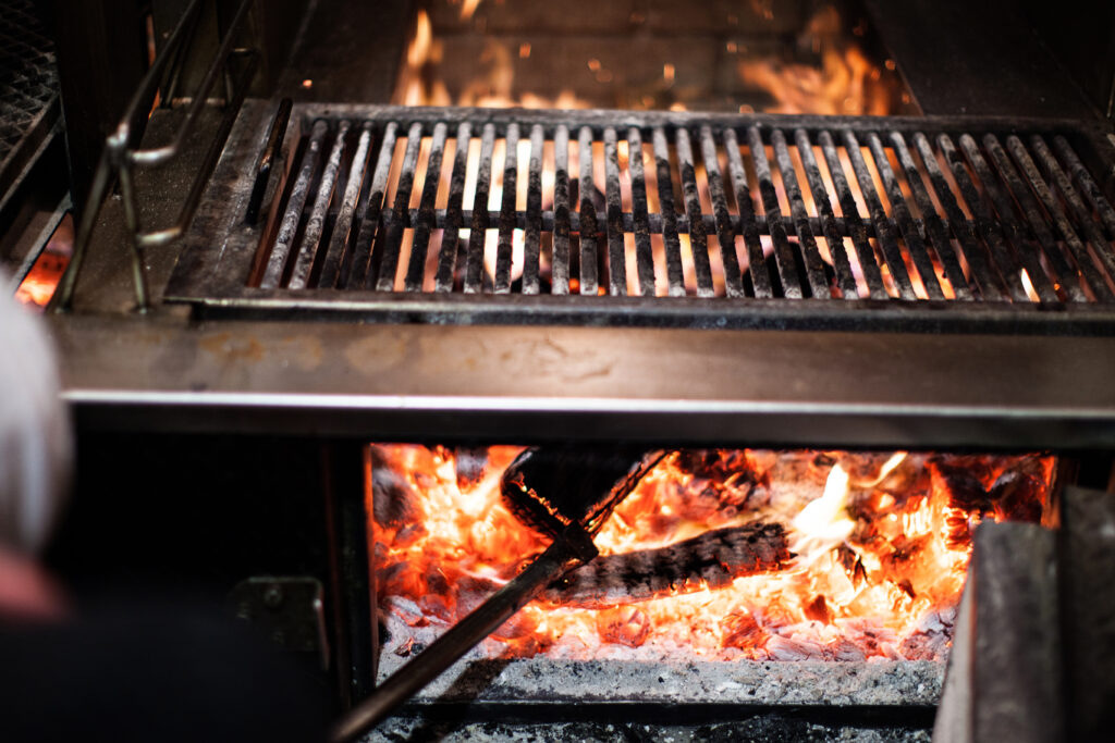Our Live Wood Fired Grill makes for great spectacle and even tastier dishes